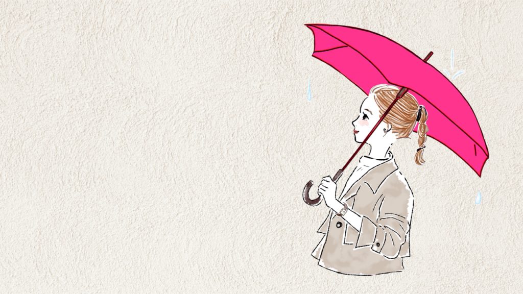 雨の日に傘をさす女性
